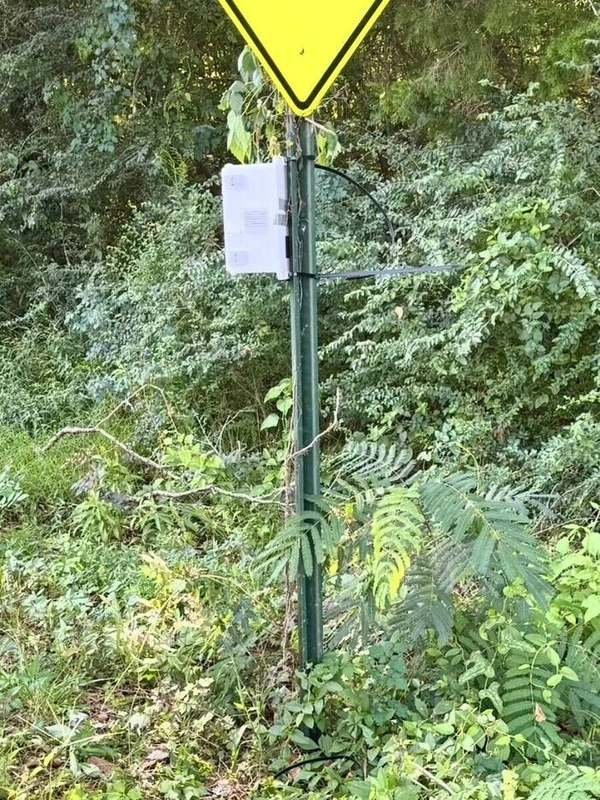 Deployed on a sign post